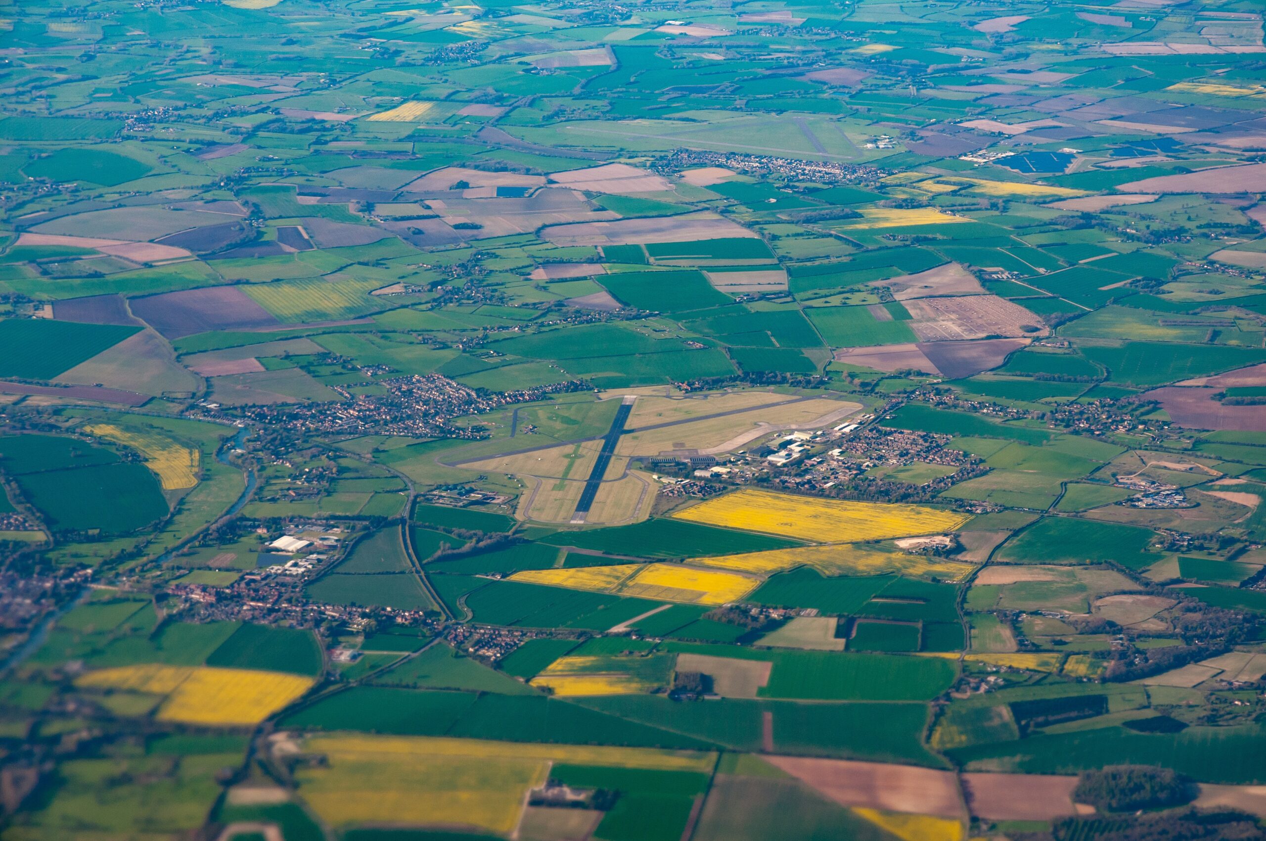 Aerial view of the countryside with an airfield in the centre